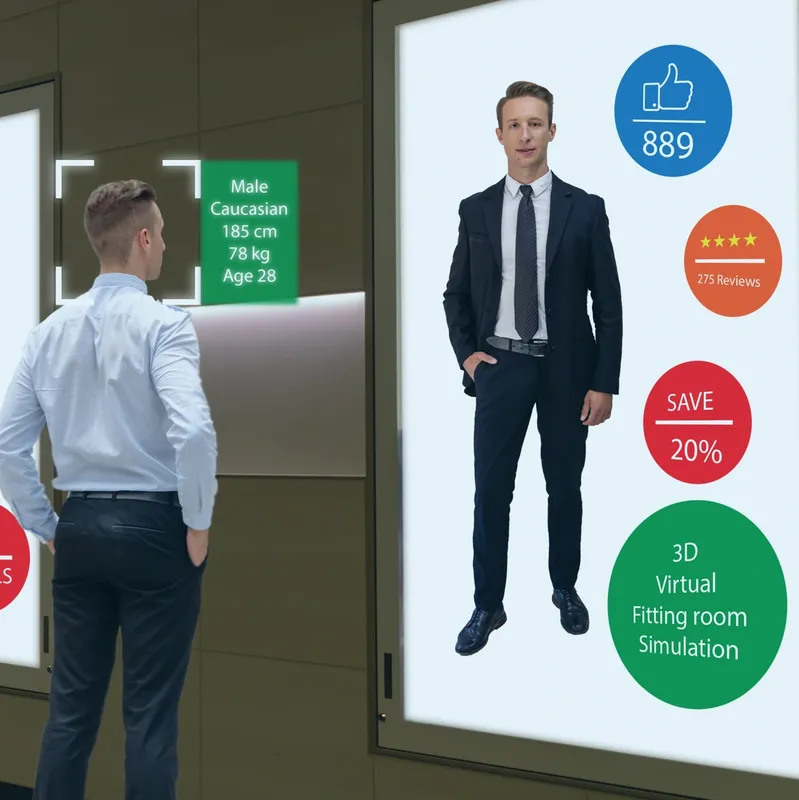 man standing infront of a Digital Sign in a store